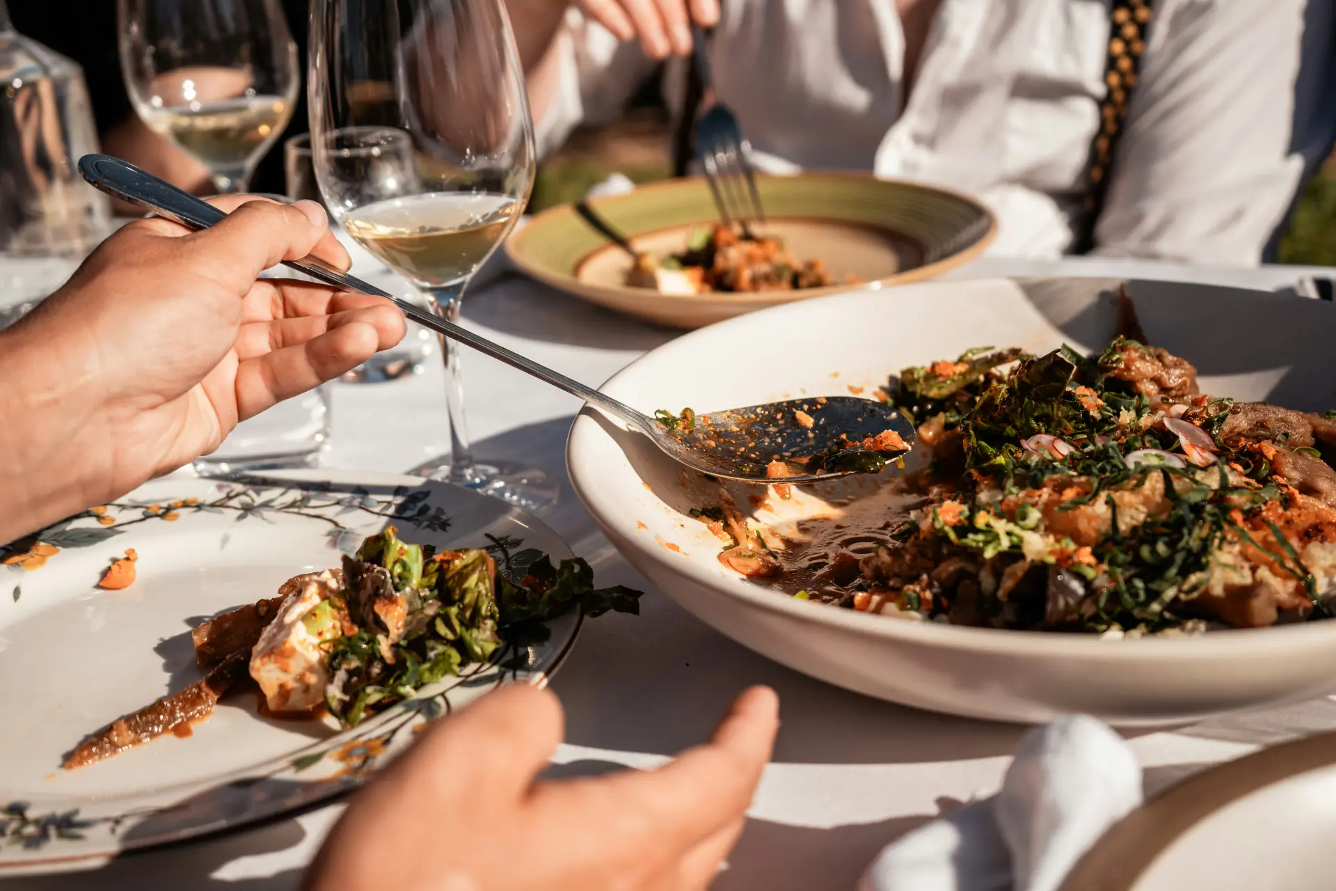 Fresh, locally inspired dishes shared at an outdoor table